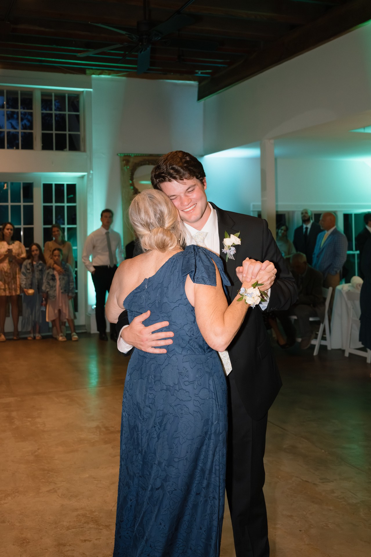 Noah dancing with his mother at the reception Noah dancing with his mother at the reception